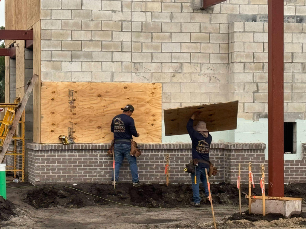 This photo shows some workers at a construction site